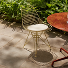 The Eames Wire Chair from Herman Miller, designed by Herman Miller x HAY outdoors.