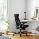 The Embody Chair from Herman Miller with black sync fabric in a lounge. all-groups