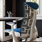 The Embody Chair from Herman Miller with blue grotto medley fabric in a family area. all-groups