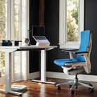 The Embody Chair from Herman Miller with blue grotto medley fabric in a living area. all-groups