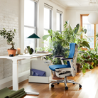 The Embody Chair from Herman Miller with blue grotto medley fabric in a living room. all-groups