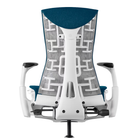 The Embody Chair from Herman Miller with blue grotto medley fabric and a white frame from the back.