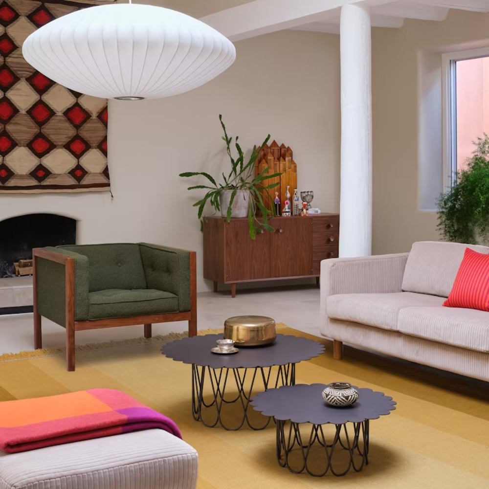 The anthracite Girard Flower Table from Herman Miller in a living room. all-groups