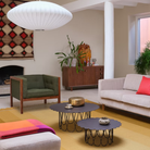 The anthracite Girard Flower Table from Herman Miller in a living room. all-groups