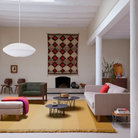 The anthracite Girard Flower Table from Herman Miller in a living space. all-groups