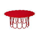 The small vivid red Girard Flower Table from Herman Miller.
