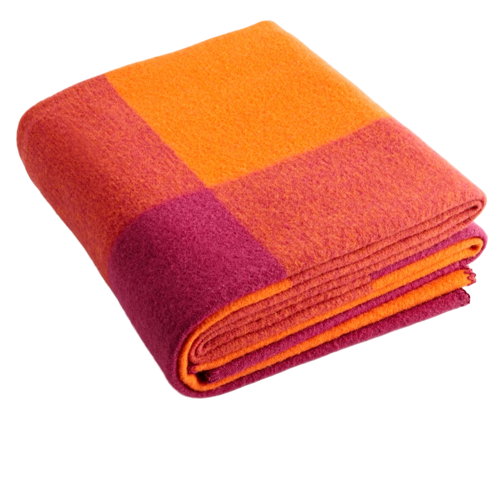 The Girard Throw Orange and Fuchsia from Herman Miller.