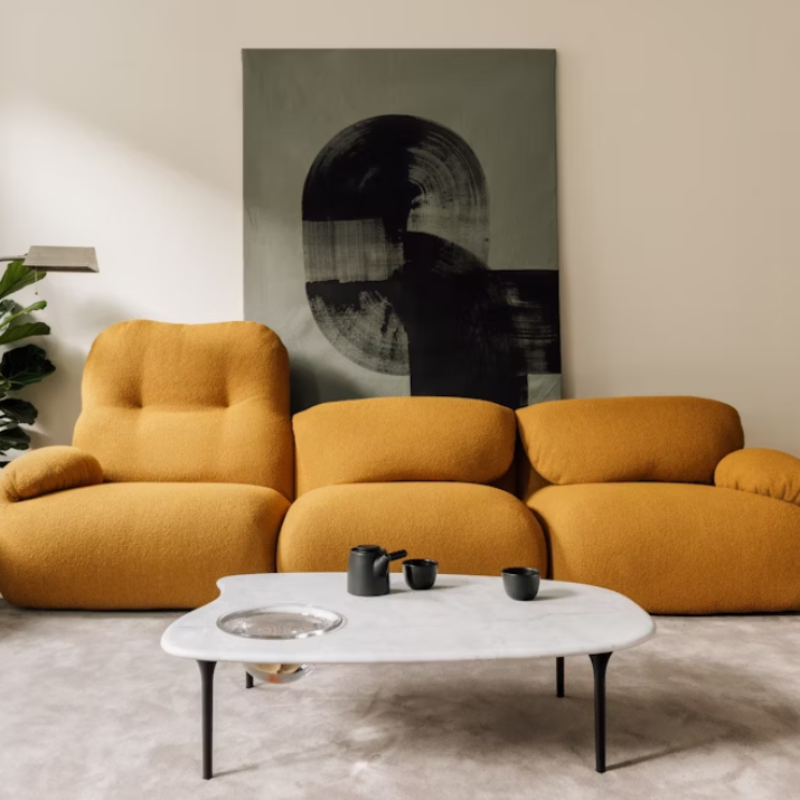 The Luva Three Seater Modular Sofa from Herman Miller in a lounge.