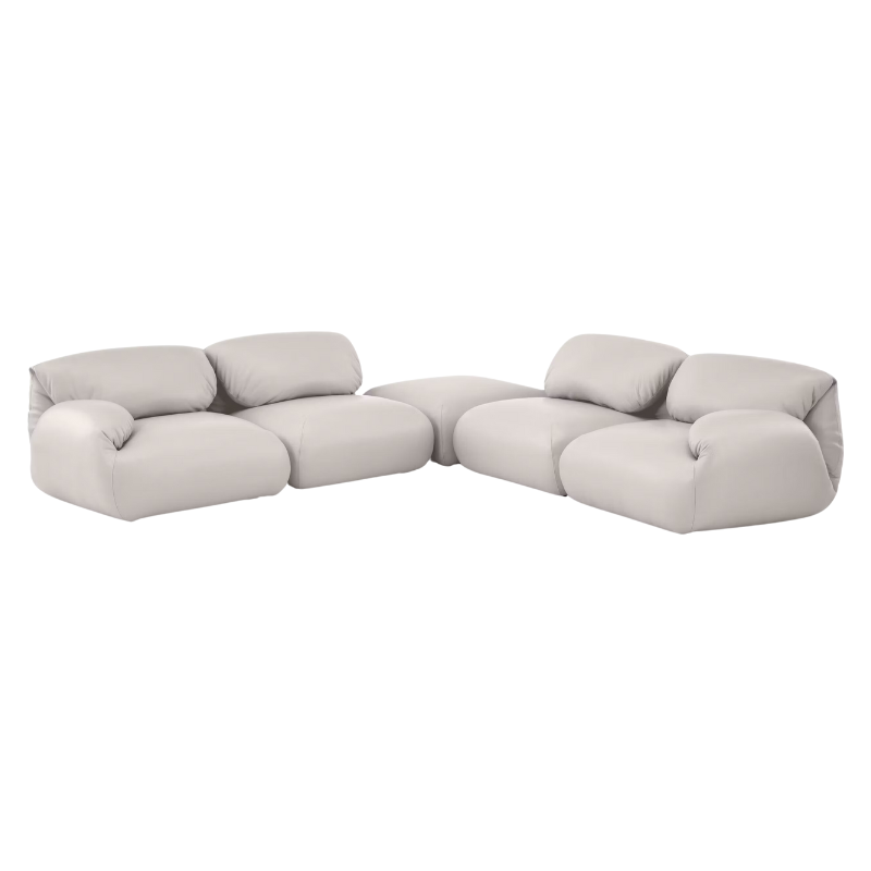 Fold up, down, or reconfigure as you please. The Luva Modular Sectional presents timeless beauty in an inventive form. Created by designer Gabriel Tan, Luva is a case study for probing at the intersections of art, design, and culture. The sectional's elemental form is inspired by the soft-rolled tops of Japanese futons and the padded tactility of a boxing glove.