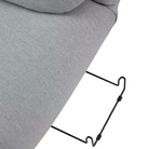 The Luva Modular Ganging Bracket from Herman Miller is used under a sectional sofa seat.