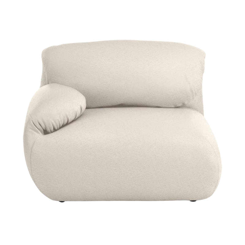 The left Luva Modular Single Seat One Arm from Herman Miller in Warm White Whim upholstery.