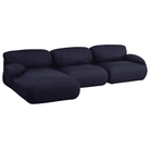 The left Luva Modular Three Seater Sectional from Herman Miller in Navy Whim upholstery.