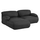 The left Luva Modular Two Seater Sectional from Herman Miller in Heathered Black Cozy upholstery.