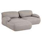 The left Luva Modular Two Seater Sectional from Herman Miller in Heathered Rye Grass Cozy upholstery.