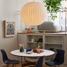 The Nelson Ball Bubble Pendant from Herman Miller suspended above a dining table.