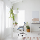 The Nelson Ball Crisscross Bubble Pendant from Herman Miller in an office.