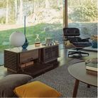 The Nelson Ball Tripod Table Lamp from Herman Miller in a living room lifestyle photograph.