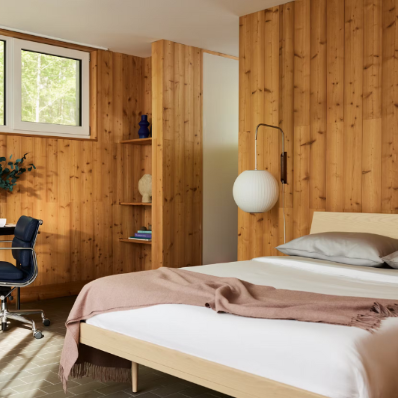 The Nelson Ball Wall Sconce from Herman Miller in a home office.