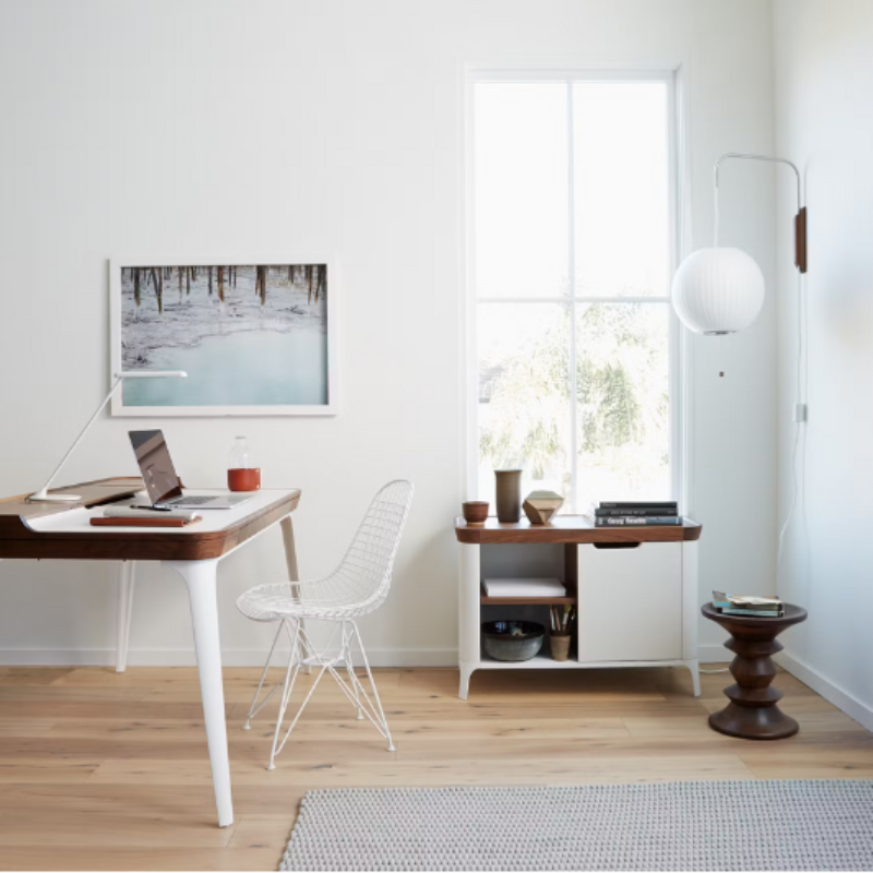 The Nelson Ball Wall Sconce from Herman Miller within a study.