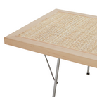 The Nelson Cane Bench from Herman Miller in a photograph of the corner.