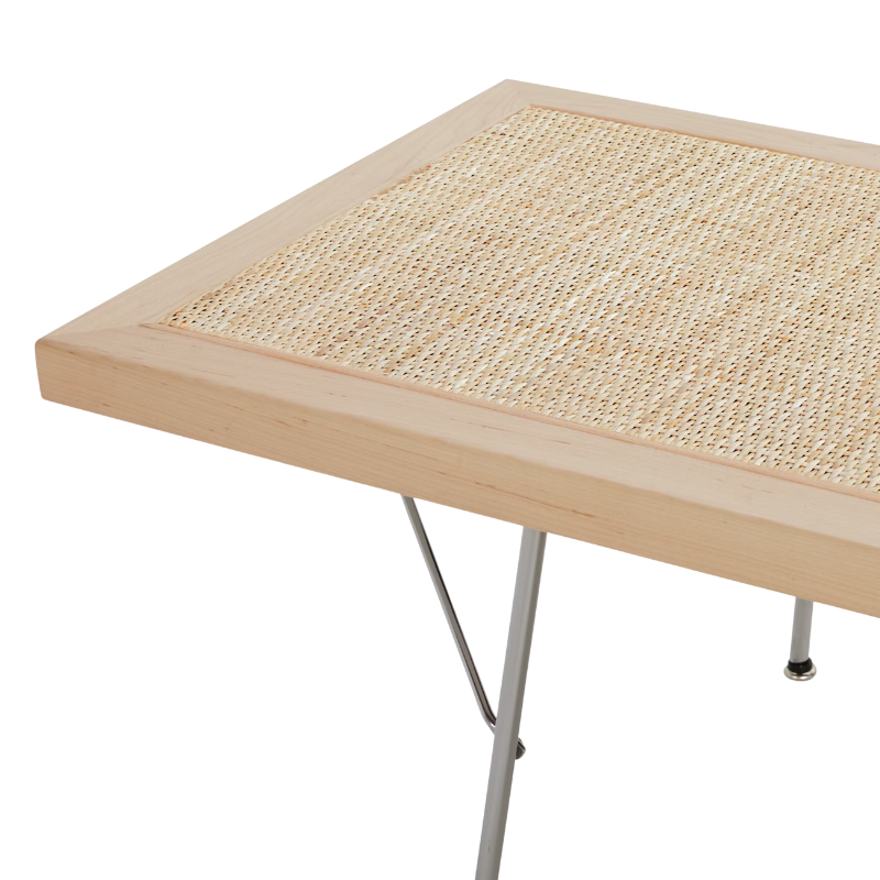 The Nelson Cane Bench from Herman Miller in a photograph of the corner.