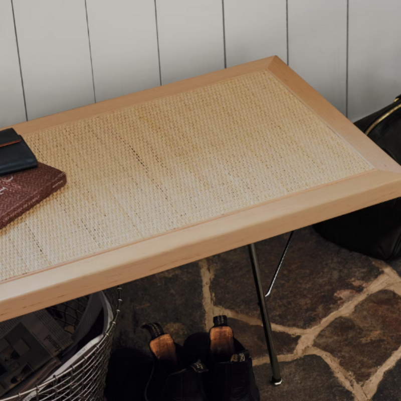 The Nelson Cane Bench from Herman Miller in a close-up photograph highlighting the seat.