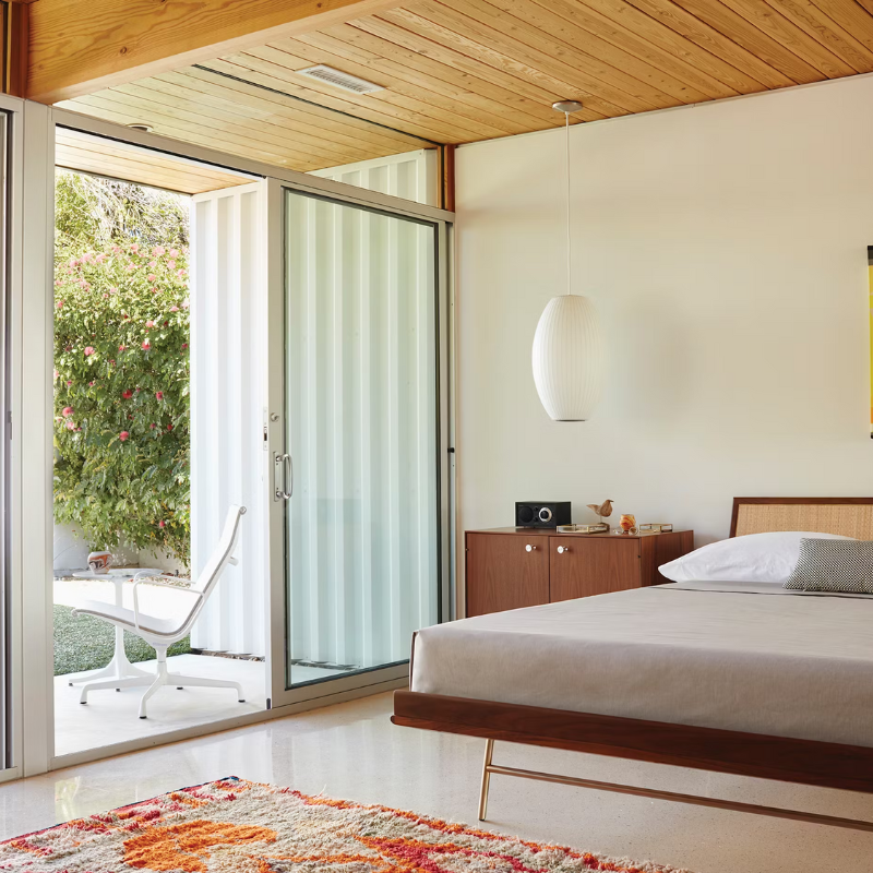 The Nelson Cigar Bubble Pendant from Herman Miller suspended within a bedroom. all-groups