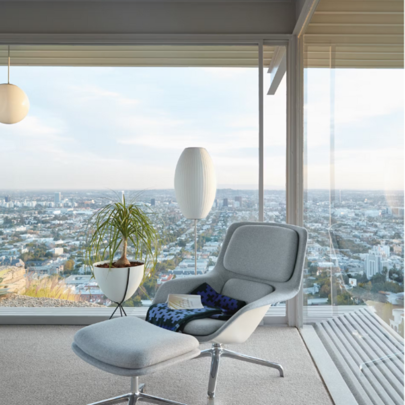 The medium brushed nickel Nelson Cigar Lotus Floor Light from Herman Miller is in the indoor area. 