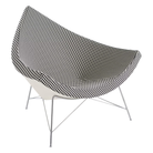 The Nelson Coconut Chair from Herman Miller with the black and white checker upholstery and chrome base.