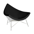 The Nelson Coconut Chair Raise Leather Black with Chrome Base from Herman Miller.