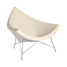 The Nelson Coconut Chair Raise Leather Creme with Chrome Base from Herman Miller.