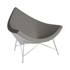 The Nelson Coconut Chair Raise Leather Dovetail with Chrome Base from Herman Miller.