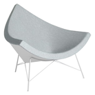 The Nelson Coconut Chair from Herman Miller with the intaglio mode upholstery and white base.
