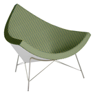 The Nelson Coconut Chair from Herman Miller with the ultramarine and dark emerald checker upholstery and chrome base.
