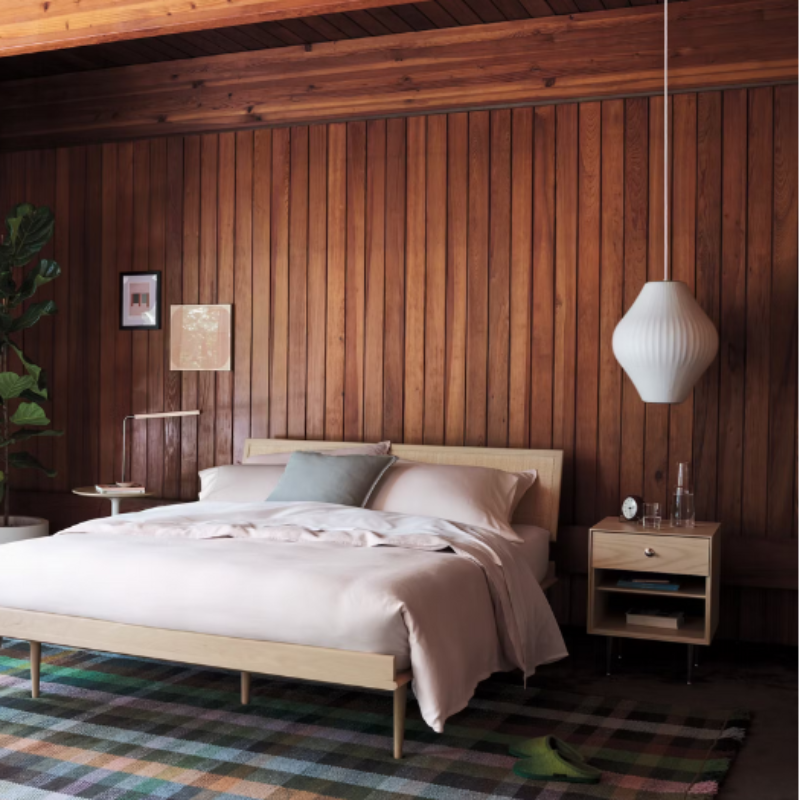 The Nelson Pear Bubble Pendant from Herman Miller in a bedroom.