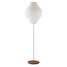 The medium Nelson Pear Lotus Floor Light from Herman Miller in walnut.