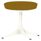 The Nelson Pedestal Stool from Herman Miller with dark ochre hopsak upholstery and a white base.