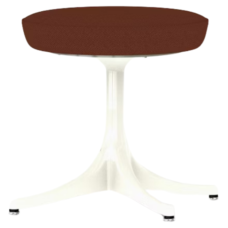 The Nelson Pedestal Stool from Herman Miller with terra cotta hopsak upholstery and a white base.