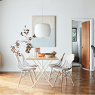 The Nelson Roll Bubble Pendant from Herman Miller in a dining room.