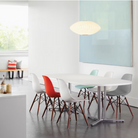 The Nelson Saucer Bubble Pendant from Herman Miller within a dining room.