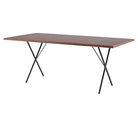 The walnut and black Nelson X-Leg Table from Herman Miller turned.