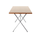 The 36 by 72 inch walnut and chrome Nelson X-Leg Table from Herman Miller from the side.