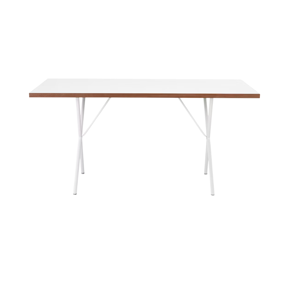 The 30 by 60 inch white Nelson X-Leg Table from Herman Miller from the long side.