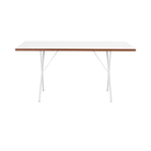 The 30 by 60 inch white Nelson X-Leg Table from Herman Miller from the long side.