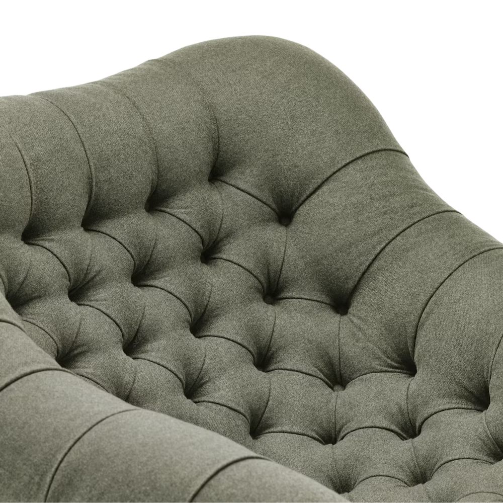 The Rohde Easy Chair from Herman Miller with the agrarian luce upholstery and walnut leg finish highlighting the back rest.