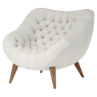 The Rohde Easy Chair from Herman Miller with the blanched luce upholstery and walnut leg finish.
