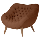 The Rohde Easy Chair from Herman Miller with the ledge prone leather upholstery and walnut leg finish.