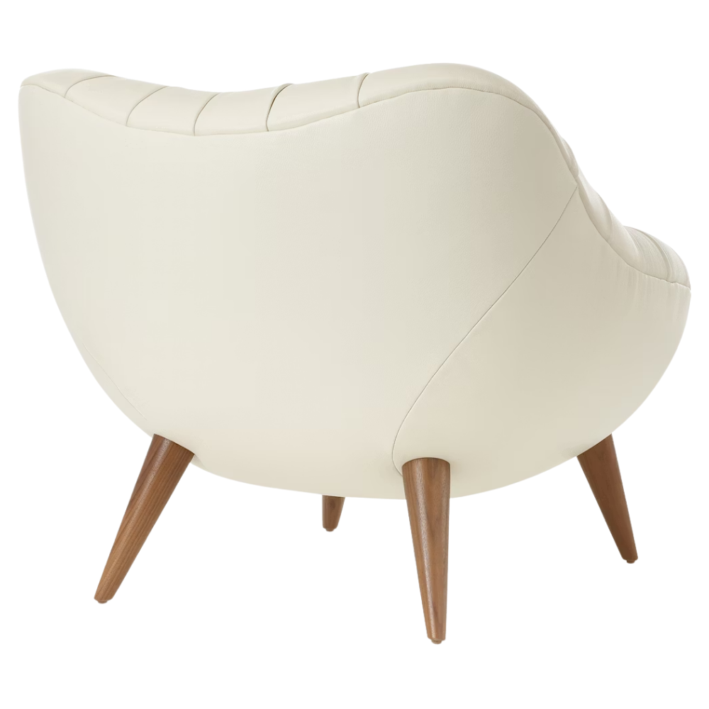 The Rohde Easy Chair from Herman Miller with the lotus prone leather upholstery and walnut leg finish from the back at an angle.