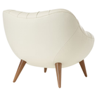 The Rohde Easy Chair from Herman Miller with the lotus prone leather upholstery and walnut leg finish from the back at an angle.