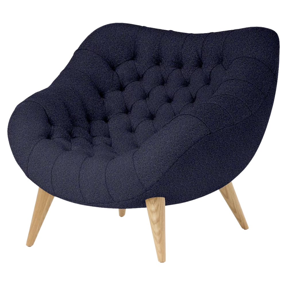 The Rohde Easy Chair from Herman Miller with the navy whim upholstery and oak leg finish.